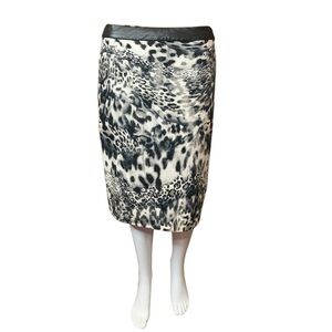 Animal print skirt with back zip and faux leather waistband, fits size 8 best